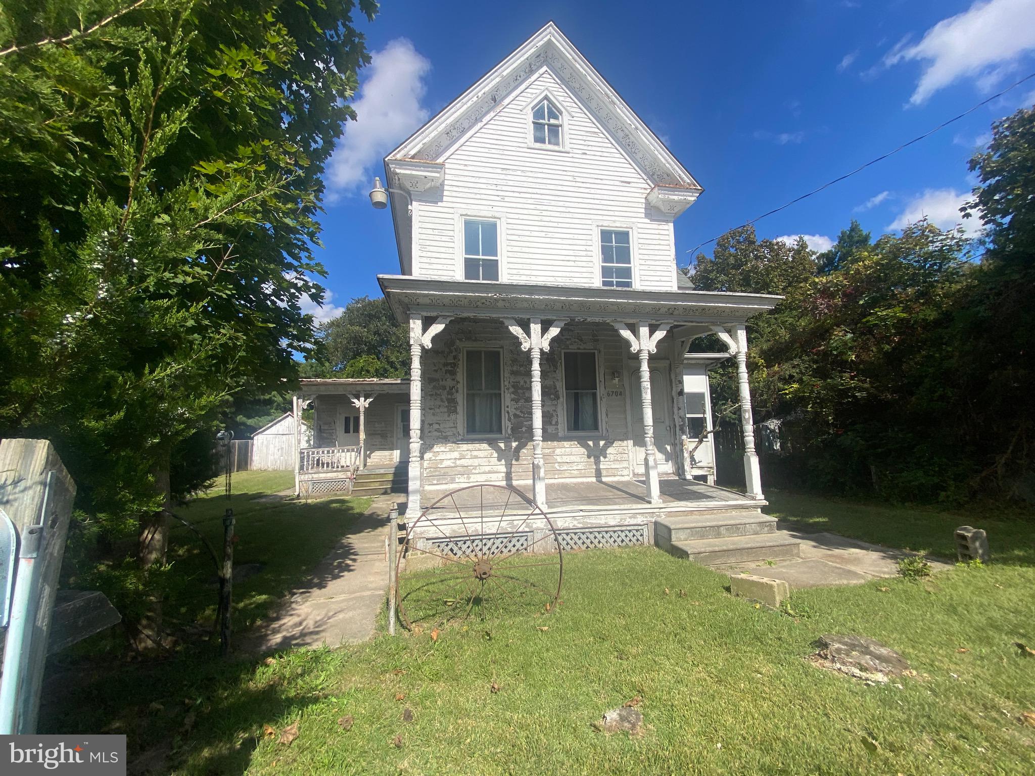 6704 Chestnut Street Port Norris, NJ 08349 - Photo 1 of 44 a view of a house with backyard sitting area and garden