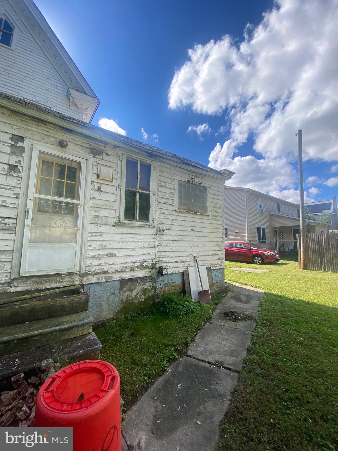 6704 Chestnut Street Port Norris, NJ 08349 - Photo 12 of 44 a front view of house with yard
