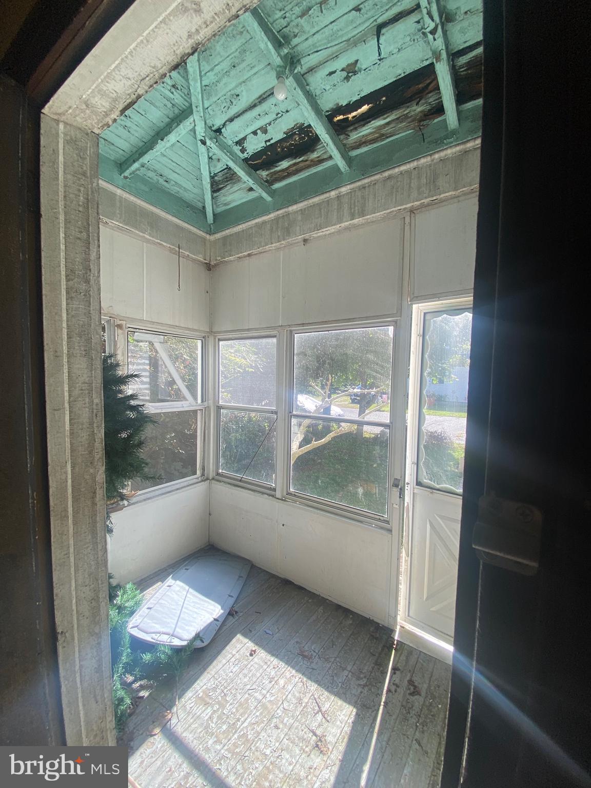 6704 Chestnut Street Port Norris, NJ 08349 - Photo 17 of 44 a bathroom with a glass shower door