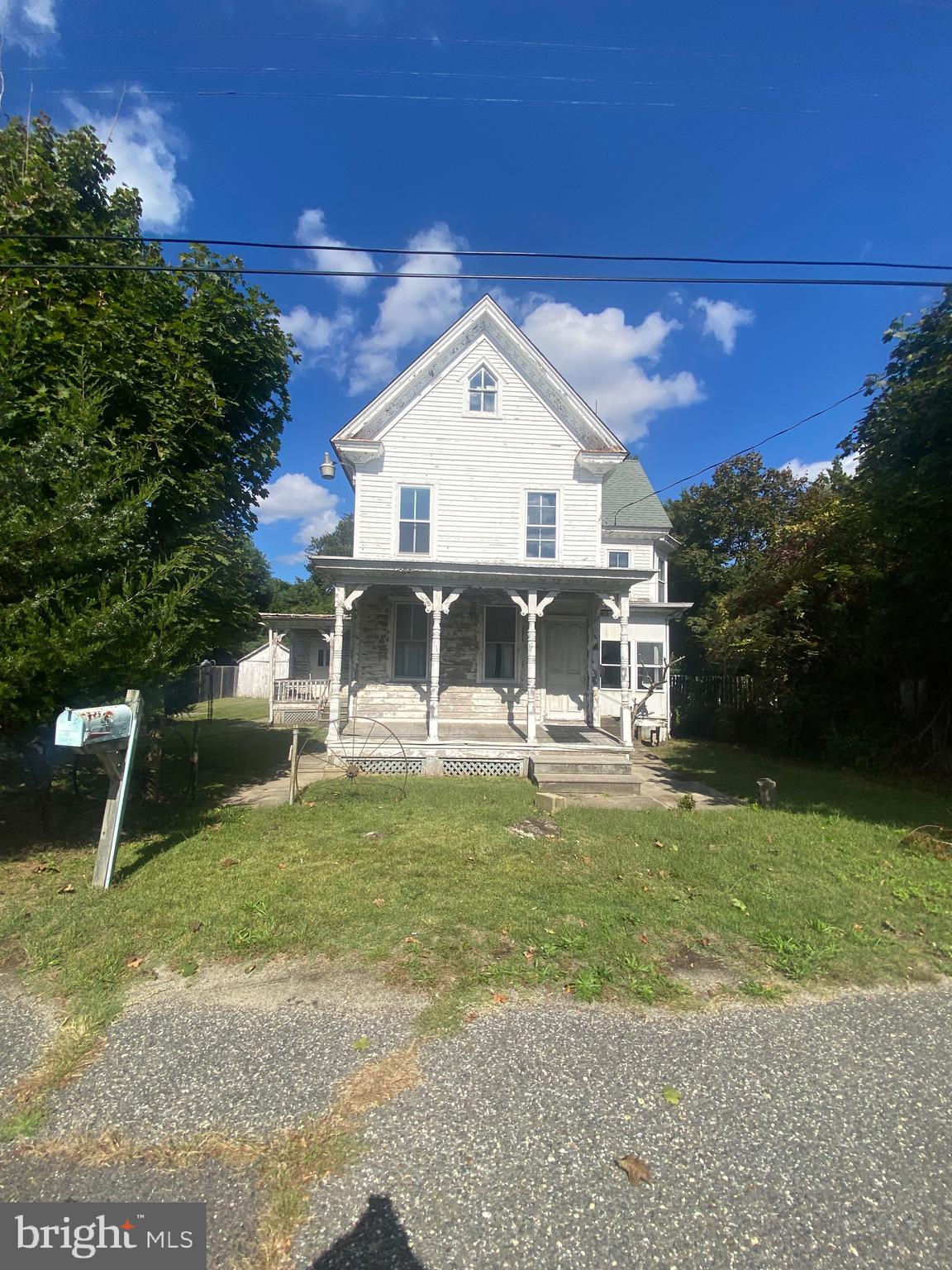 6704 Chestnut Street Port Norris, NJ 08349 - Photo 2 of 44 a front view of a house with a yard