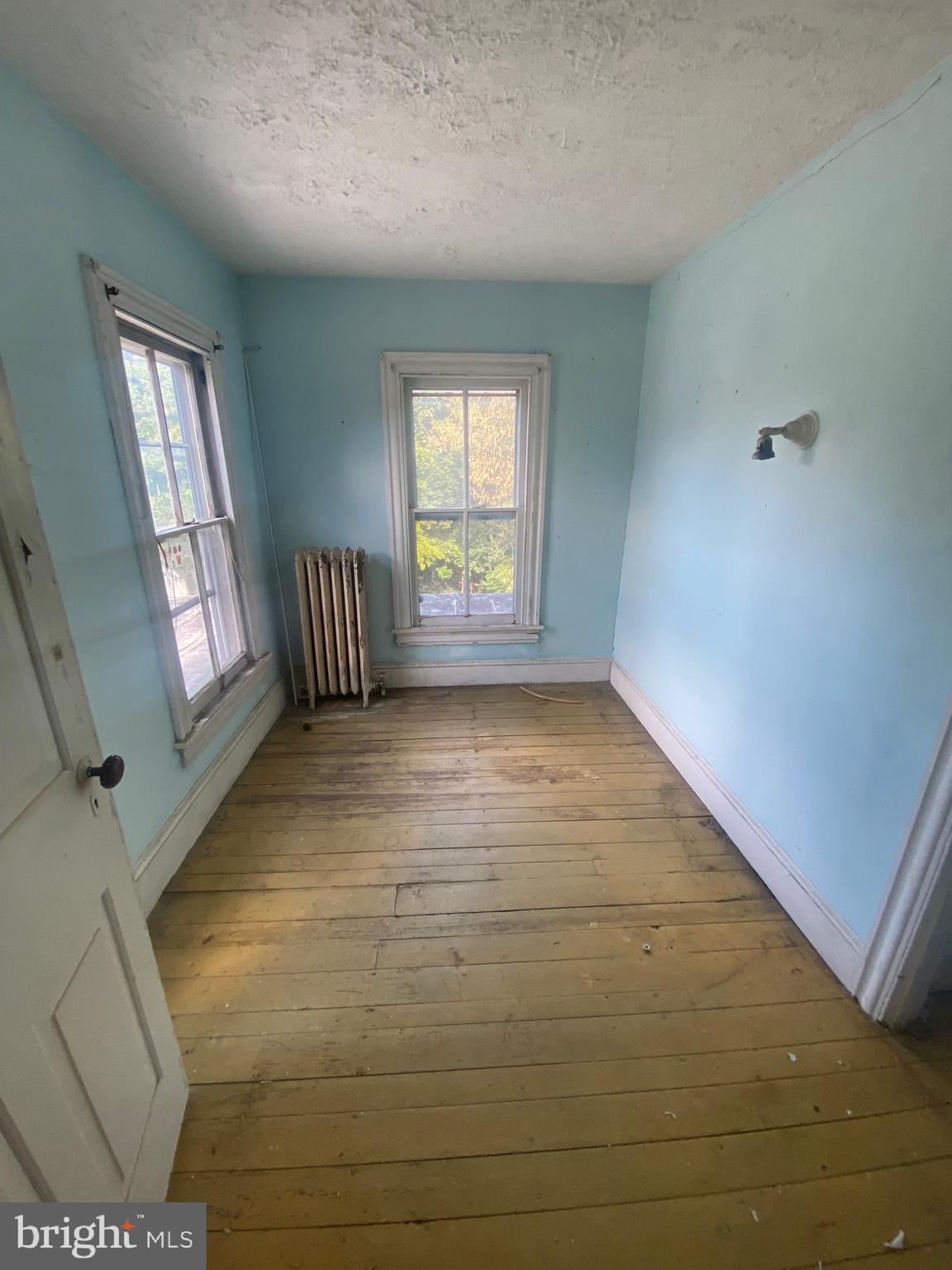 6704 Chestnut Street Port Norris, NJ 08349 - Photo 21 of 44 a view of an empty room with glass door