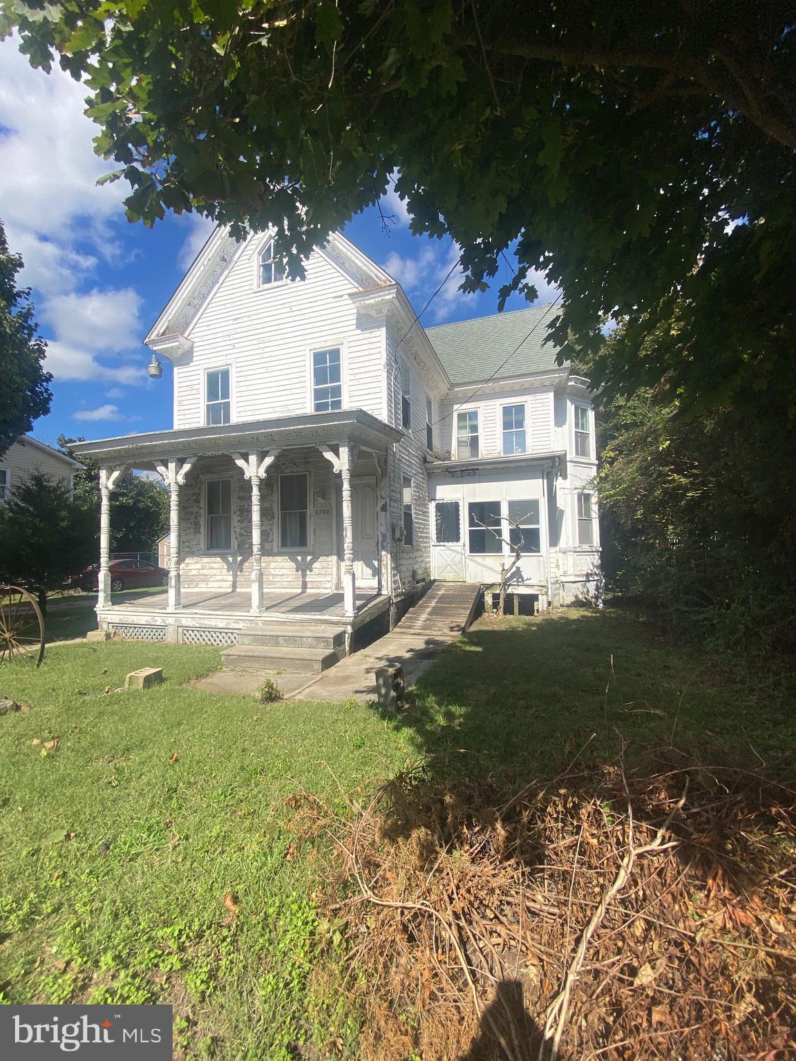 6704 Chestnut Street Port Norris, NJ 08349 - Photo 3 of 44 a front view of a house with a yard