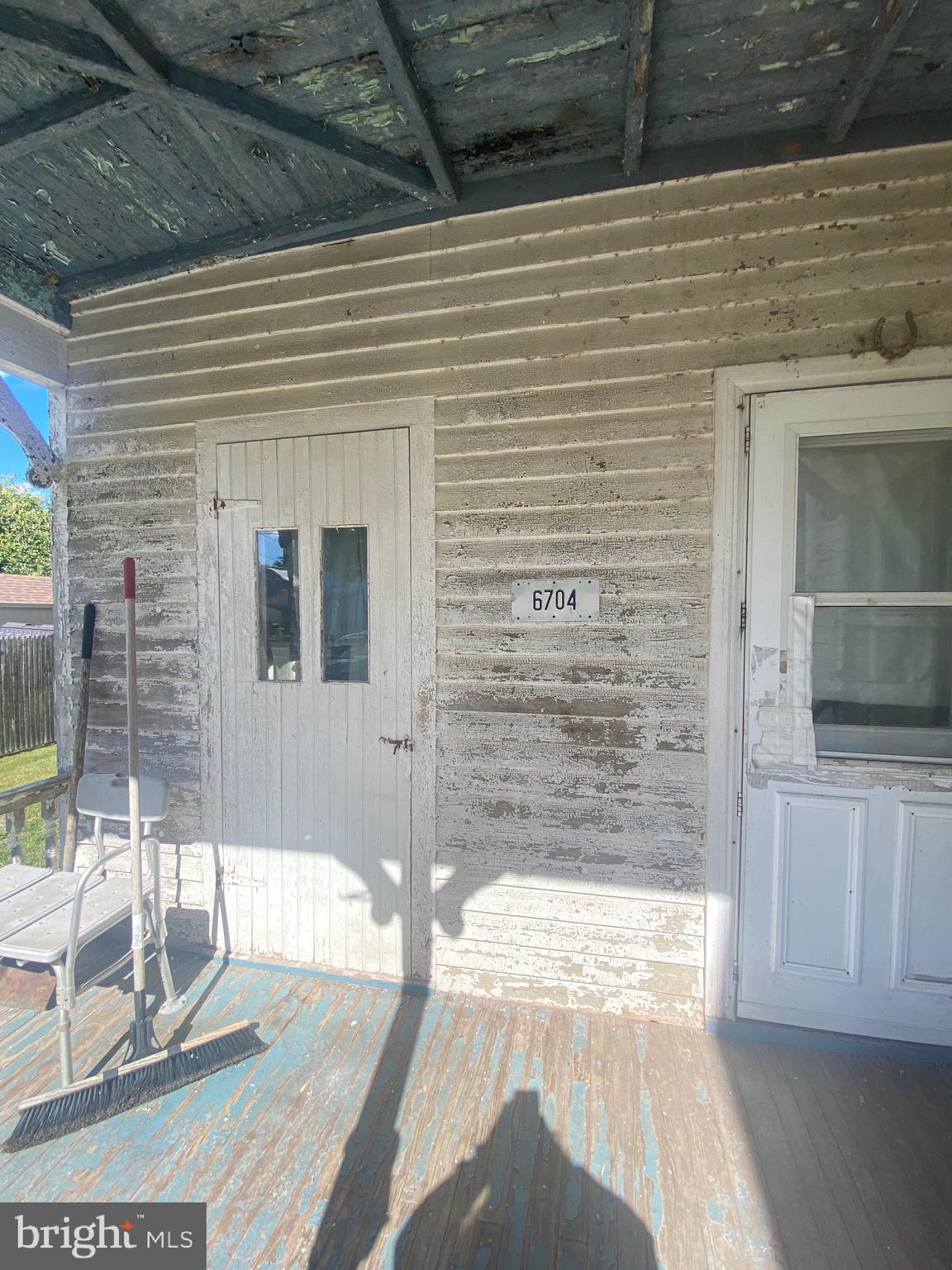 6704 Chestnut Street Port Norris, NJ 08349 - Photo 6 of 44 a view of entrance door of the house