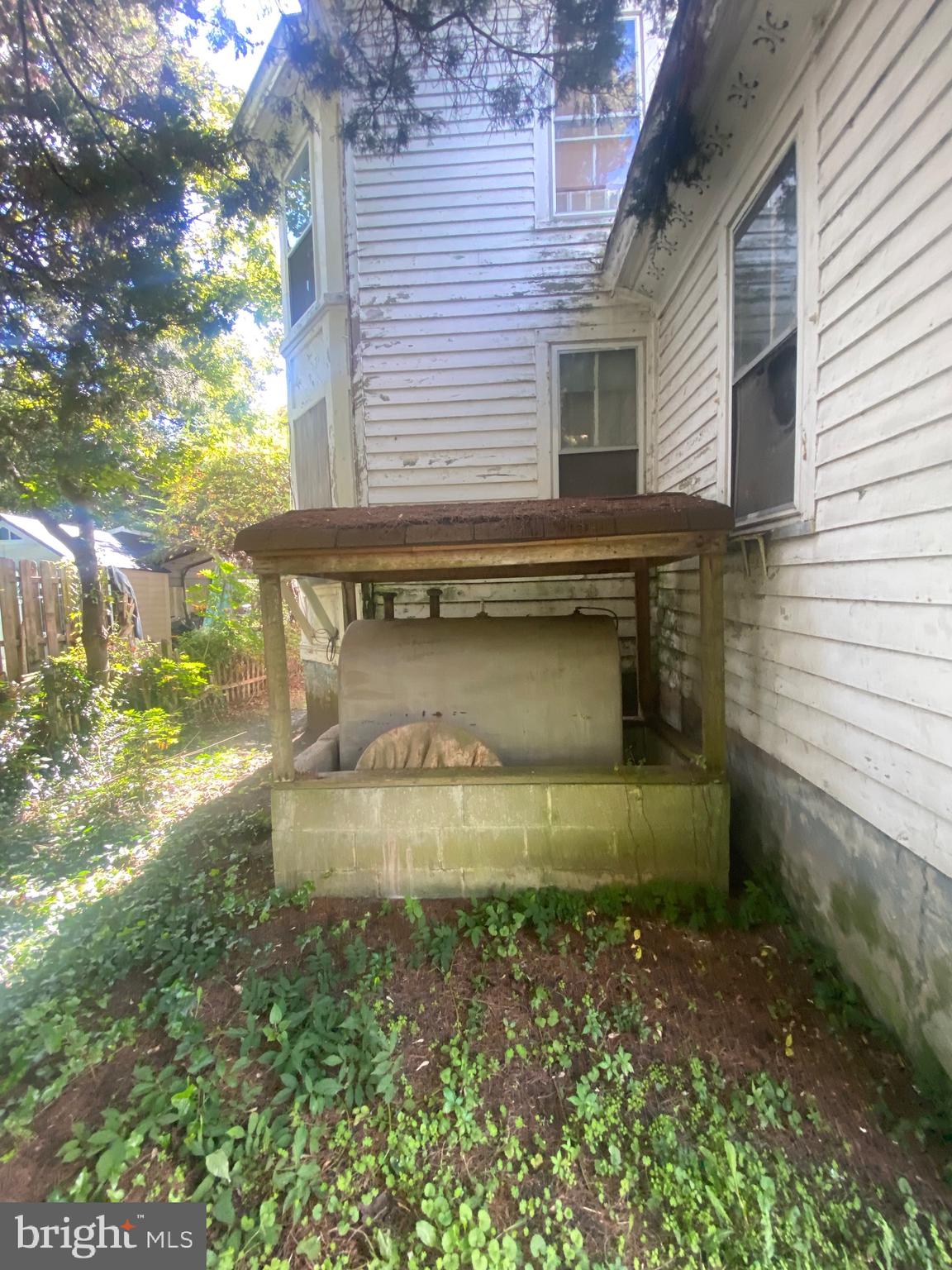 6704 Chestnut Street Port Norris, NJ 08349 - Photo 8 of 44 a view of a back yard of the house