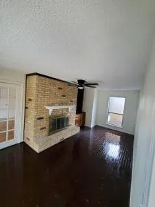 a view of an empty room and window