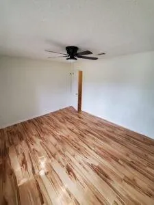 a bathroom with a double vanity sink and mirror