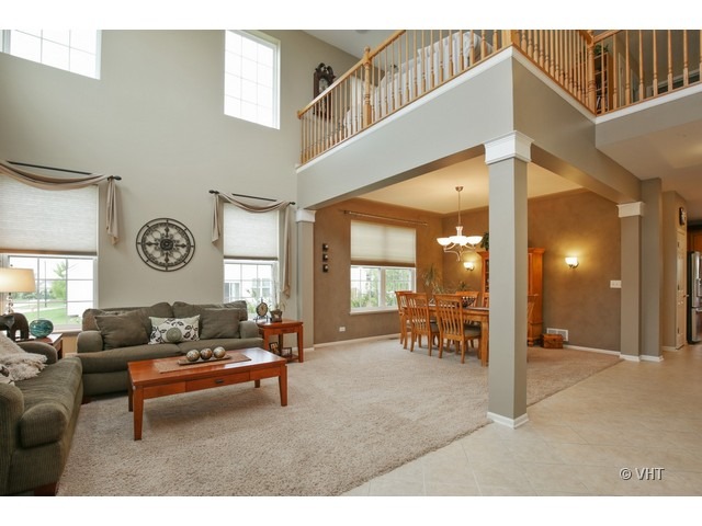 3038 Range Road Elgin, IL 60124 - Photo 2 of 10 a living room with furniture and a large window