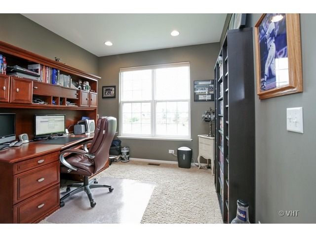 3038 Range Road Elgin, IL 60124 - Photo 6 of 10 a view of a workspace with furniture and a window