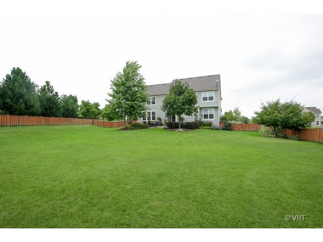 3038 Range Road Elgin, IL 60124 - Photo 10 of 10 a view of a field of grass and trees