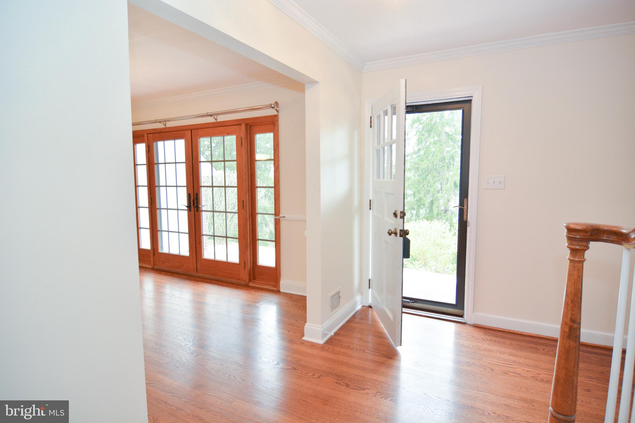 404 Snuff Mill Road Wilmington, DE 19807 - Photo 19 of 49 Foyer view with hardwood floors and staircase