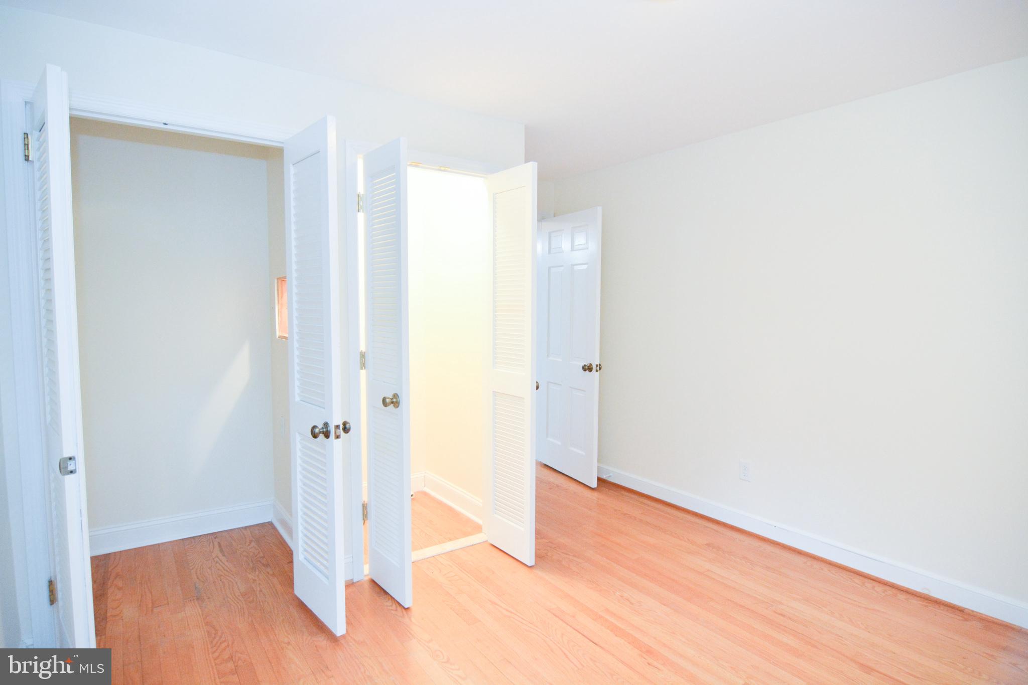 404 Snuff Mill Road Wilmington, DE 19807 - Photo 21 of 49 Large bedroom w/ hardfloor floors and closet