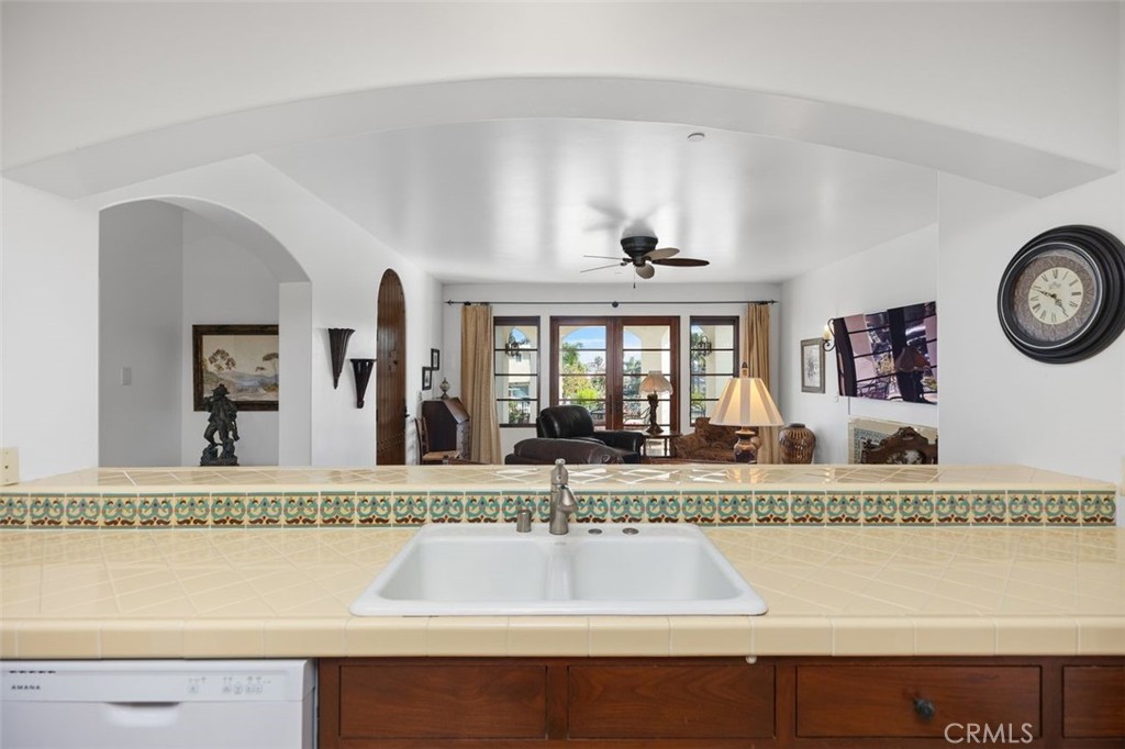 240 Avenida Rosa, Unit B San Clemente, CA 92672 - Photo 19 of 31 Kitchen looking out towards living area and private patio.