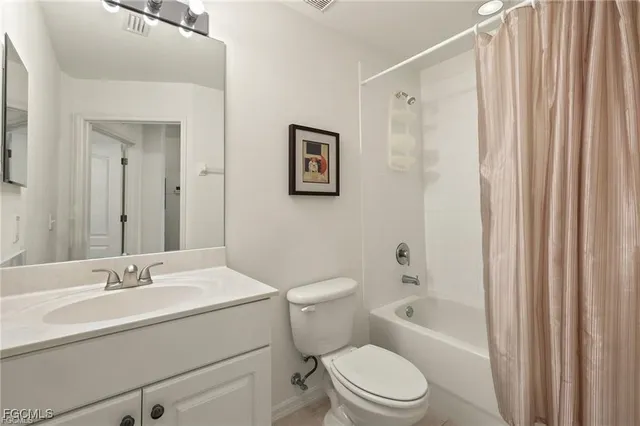 a bathroom with a toilet a sink and a bathtub