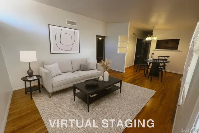 a living room with furniture and a rug