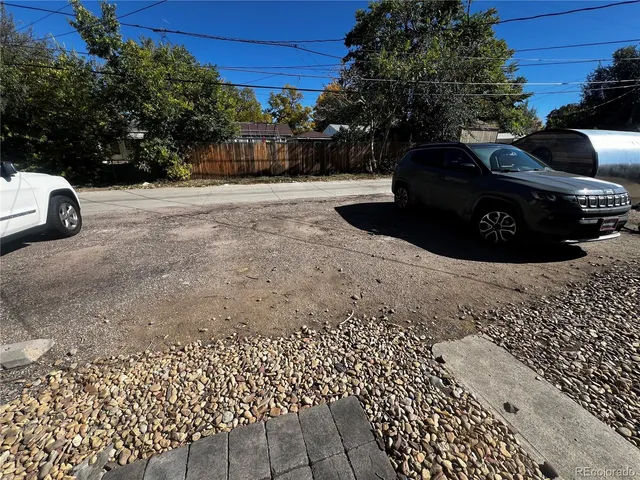 a view of a backyard of the house