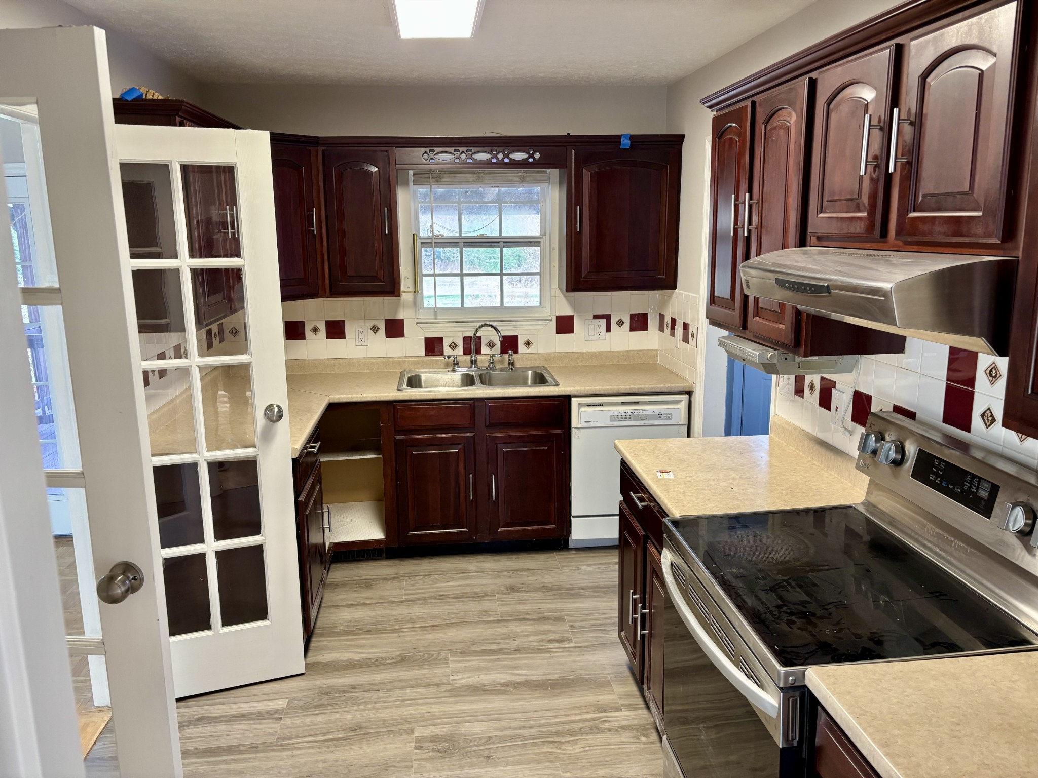 510 Gant Road Shelbyville, TN 37160 - Photo 14 of 35 a kitchen with a cabinets and stove