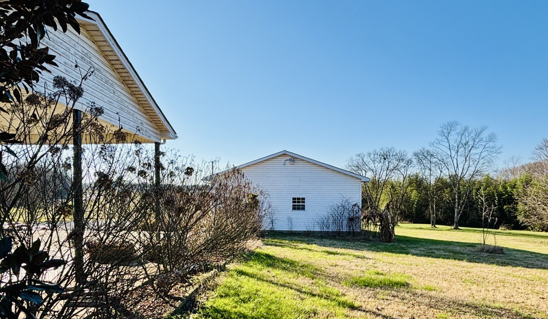 510 Gant Road Shelbyville, TN 37160 - Photo 28 of 35 a view of a house with backyard and trees