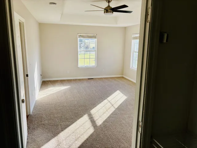 an empty room with windows