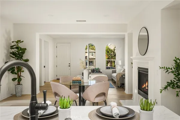 a kitchen with a sink and a stove top oven