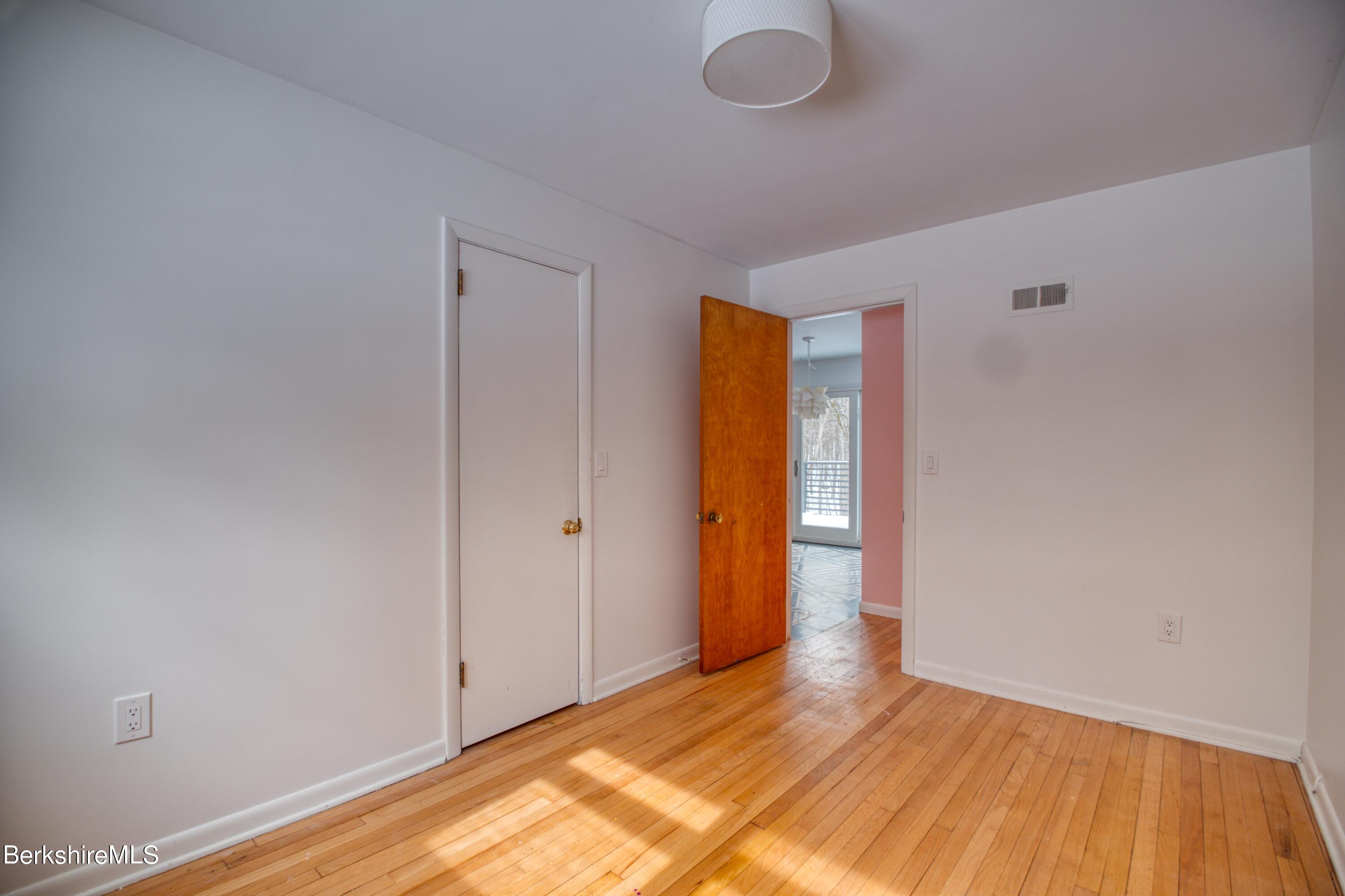 2500 State Road Richmond, MA 01254 - Photo 11 of 35 a view of an empty room and wooden floor