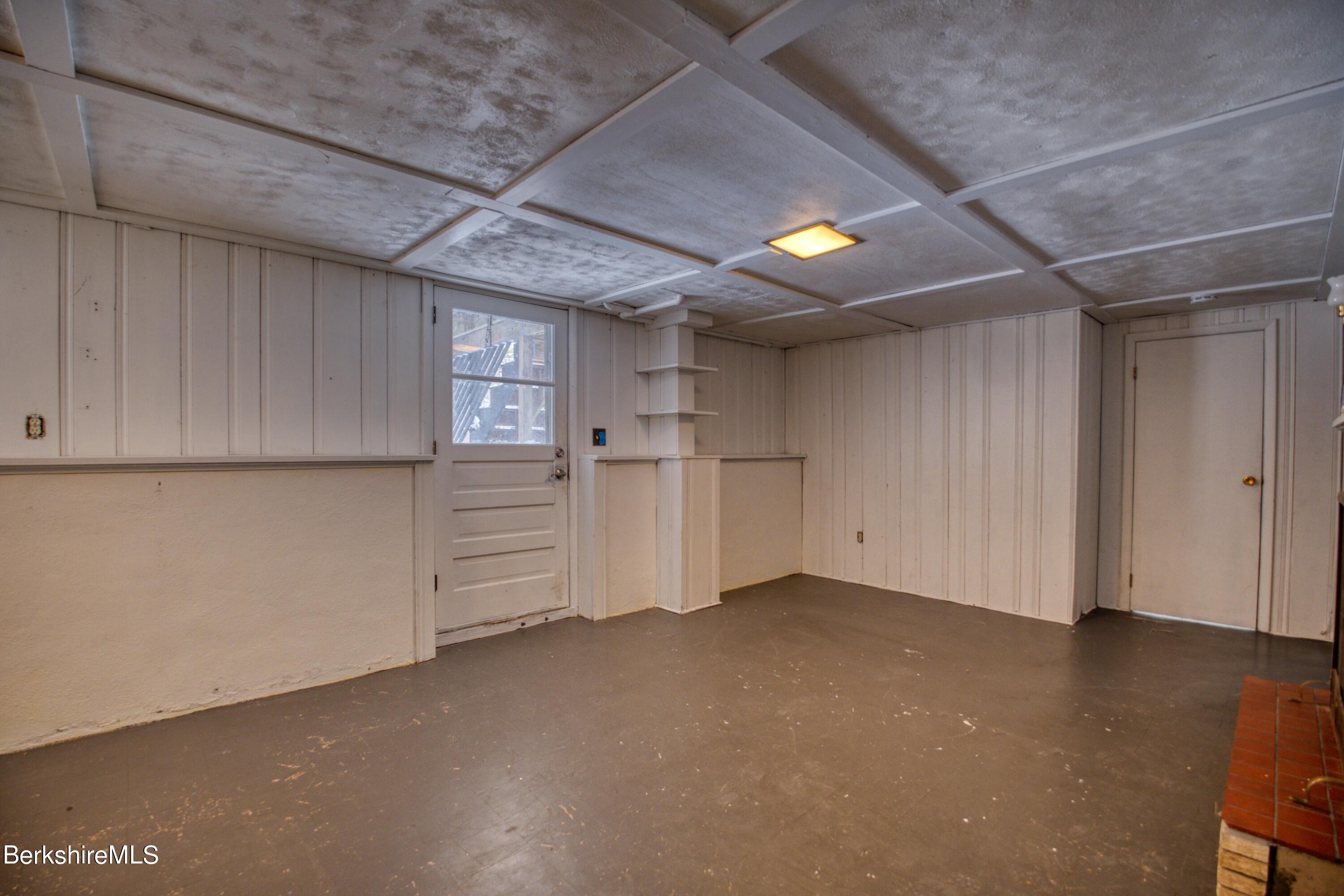 2500 State Road Richmond, MA 01254 - Photo 17 of 35 a view of empty room with wooden floor and windows