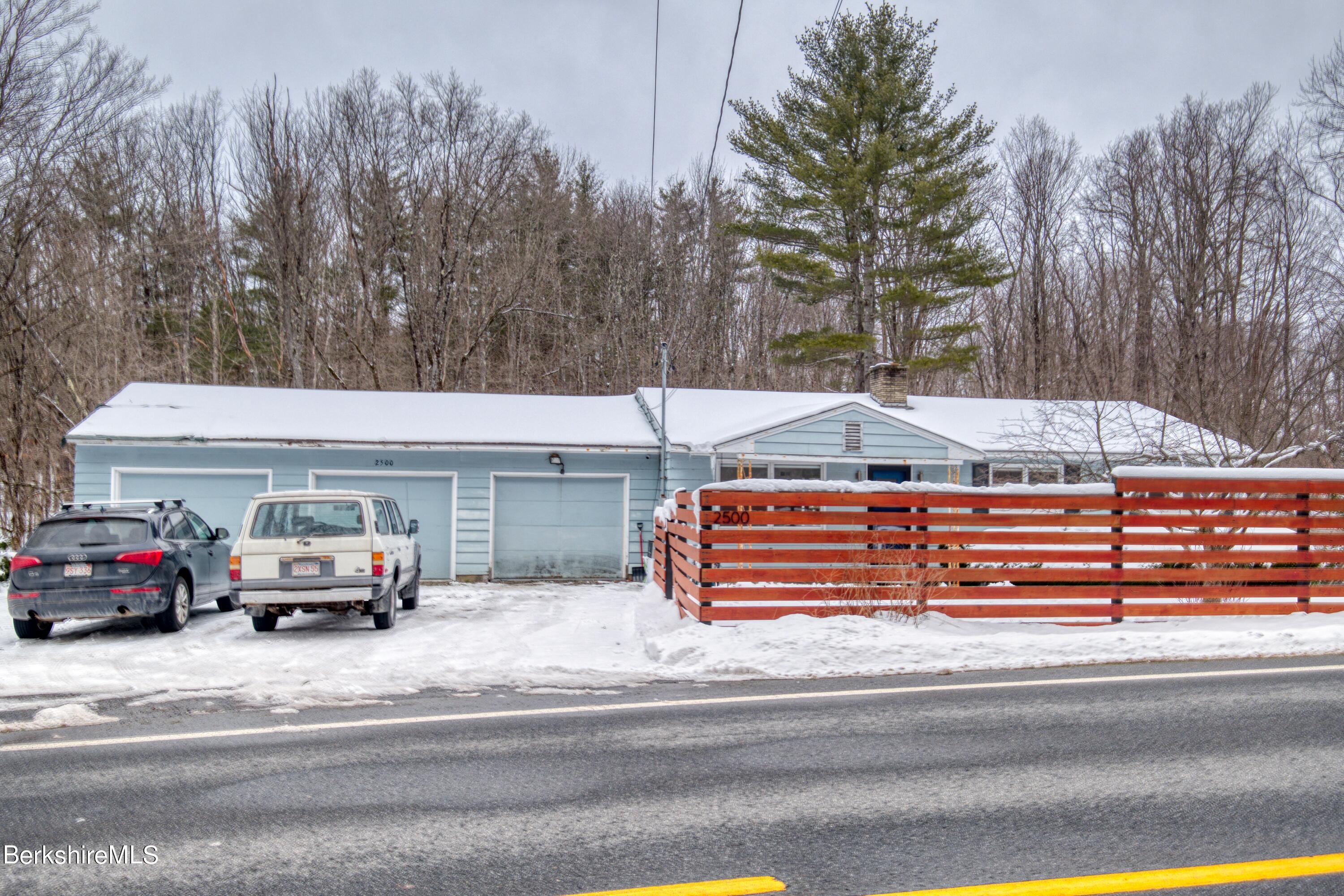 2500 State Road Richmond, MA 01254 - Photo 34 of 35 a car parked on the side of a road