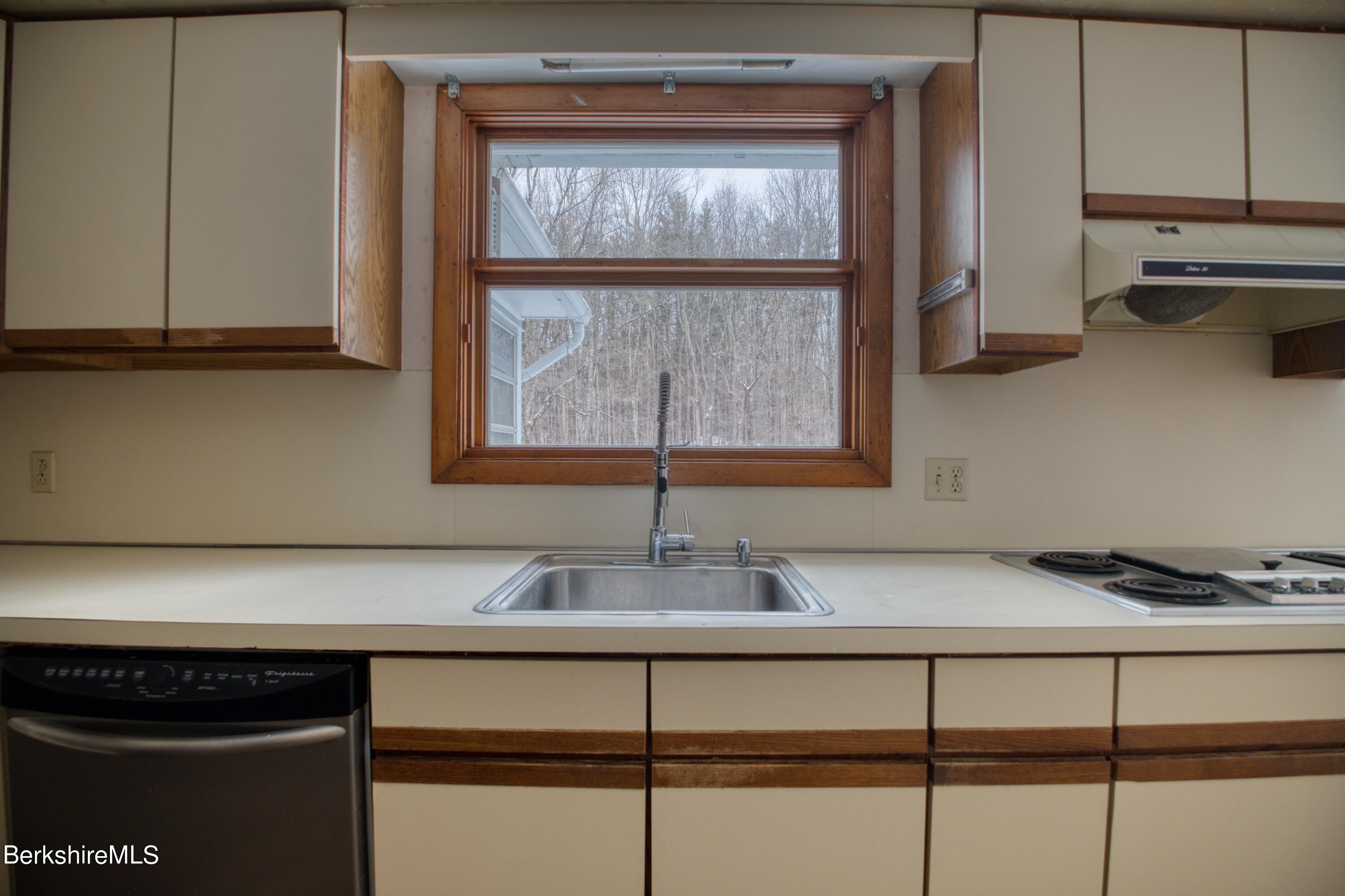 2500 State Road Richmond, MA 01254 - Photo 7 of 35 a kitchen with a sink cabinets and window