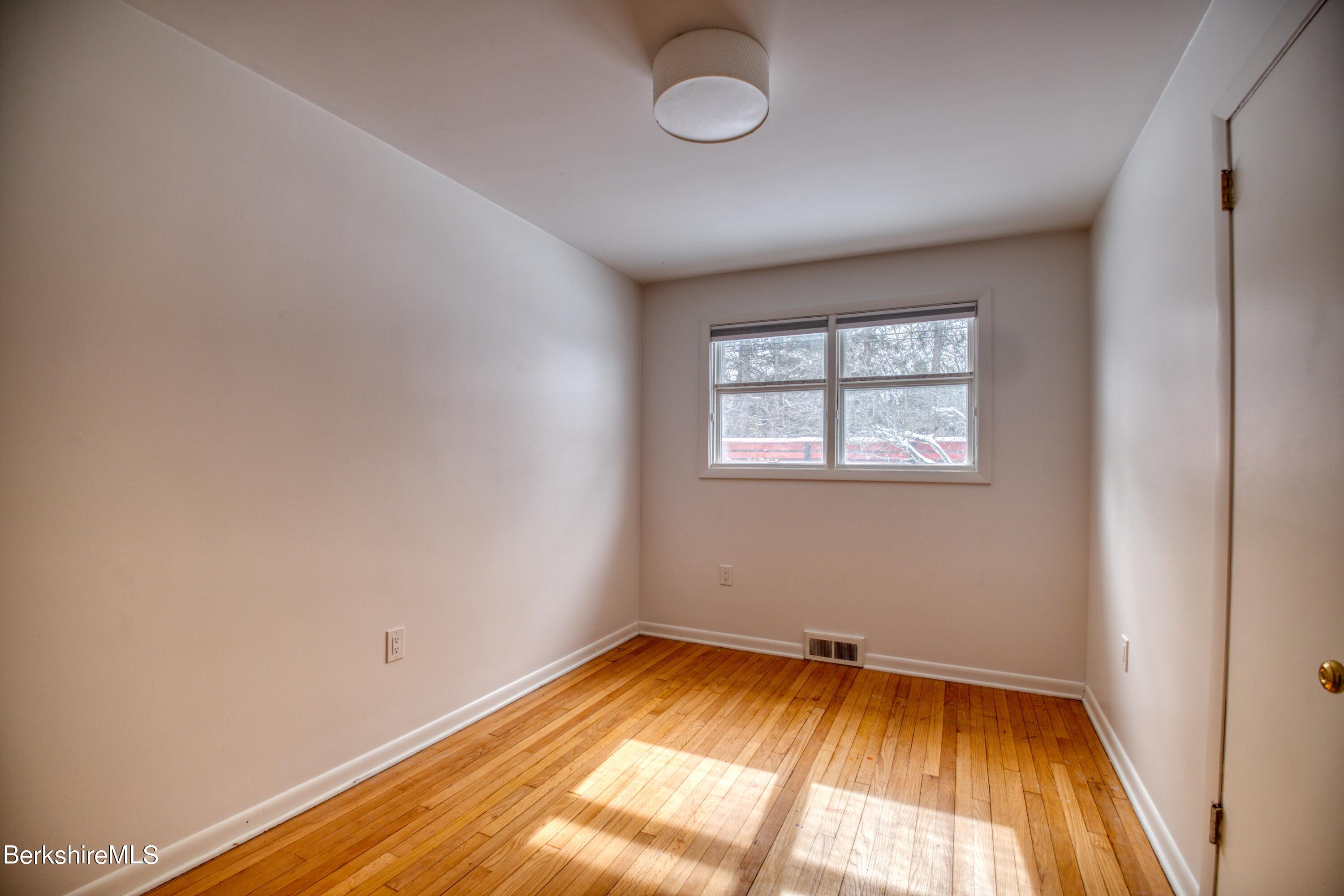 2500 State Road Richmond, MA 01254 - Photo 10 of 35 an empty room with a window