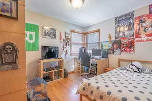 a bedroom with a bed and furniture