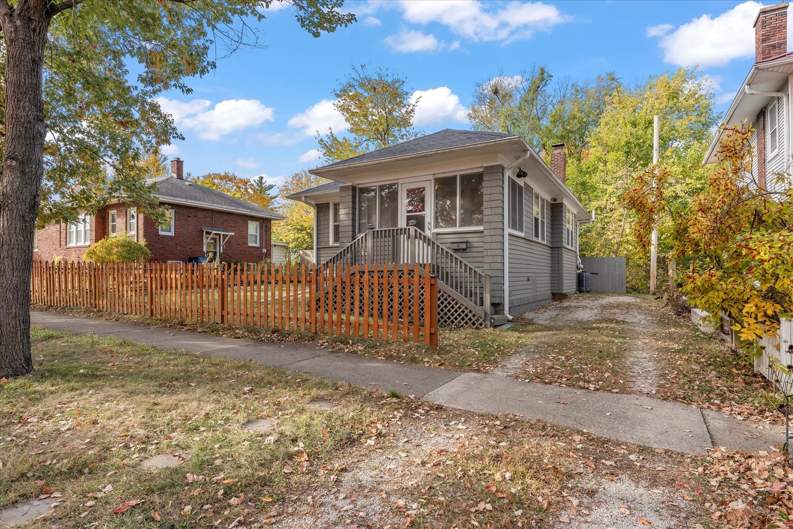 707 South Pine Street Champaign, IL 61820 - Photo 29 of 32 a front view of a house with a yard and garage