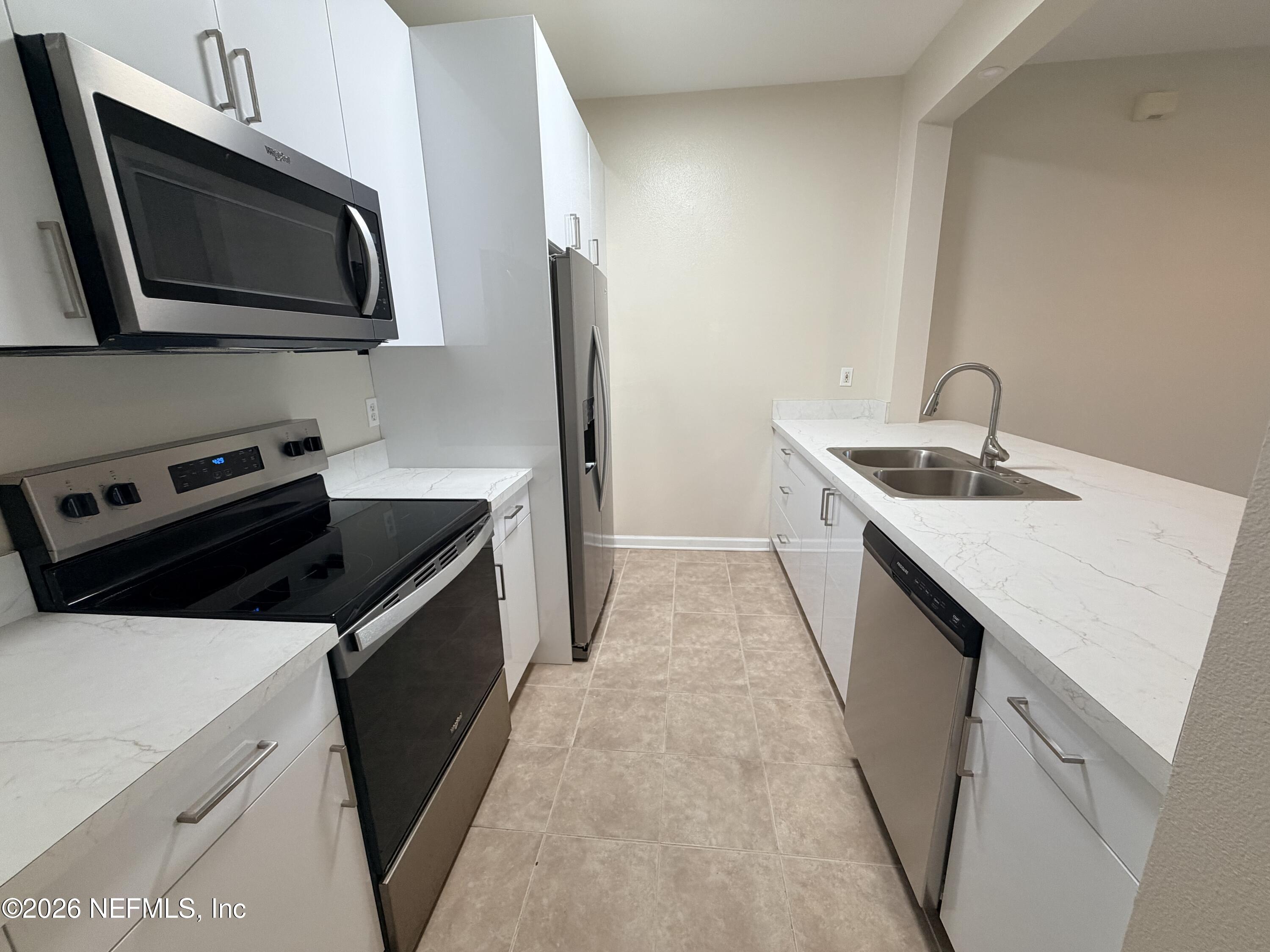 7990 Baymeadows Road East, Unit 1111 Jacksonville, FL 32256 - Photo 4 of 25 IMG_6184
