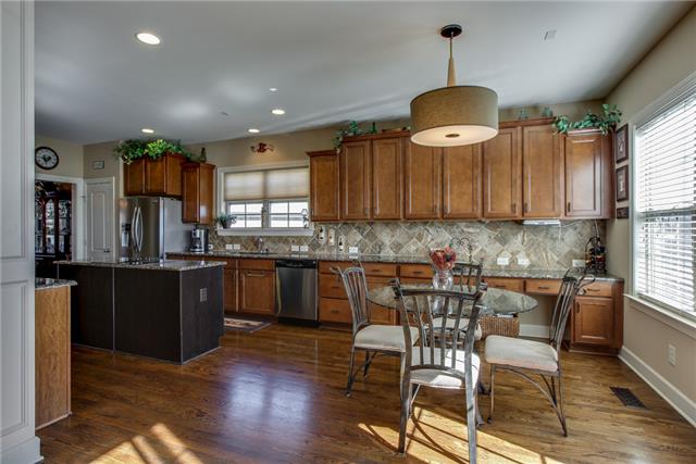 125 Circuit Road Franklin, TN 37064 - Photo 7 of 20 Expansive and sunny eat-in kitchen. Imagine having morning coffee and enjoying the view.