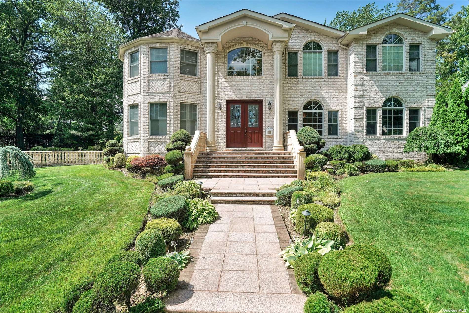 10 Ridge Road Searingtown, NY 11507 - Photo 1 of 1 a front view of a house with garden