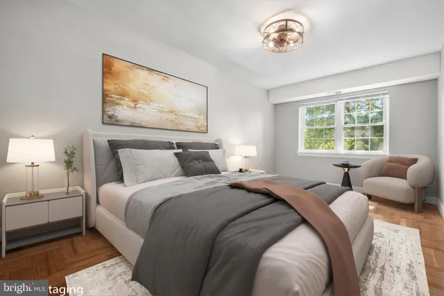 a bedroom with bed and a window