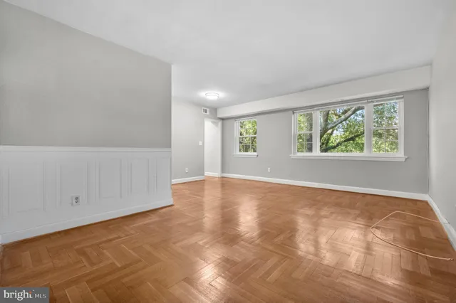 an empty room with windows