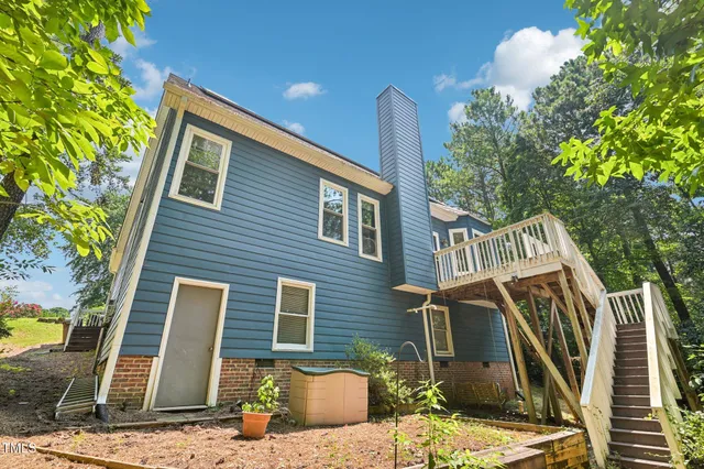 a view of a brick house with a large windows