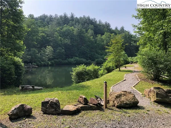 a view of a lake with a house