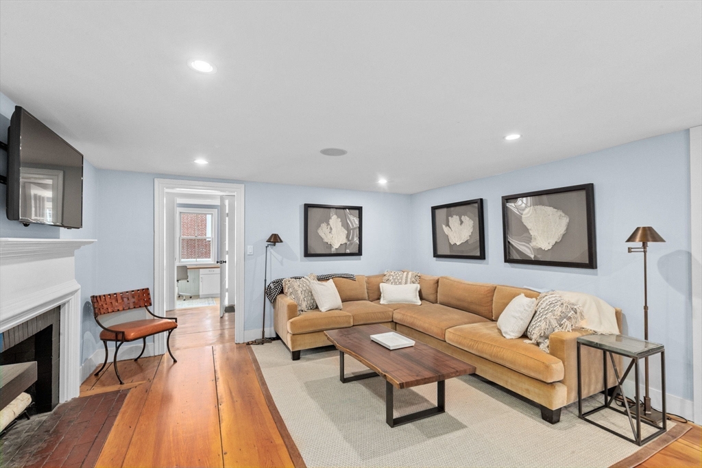 132 Main Street Hingham, MA 02043 - Photo 11 of 42 a living room with furniture and a couch