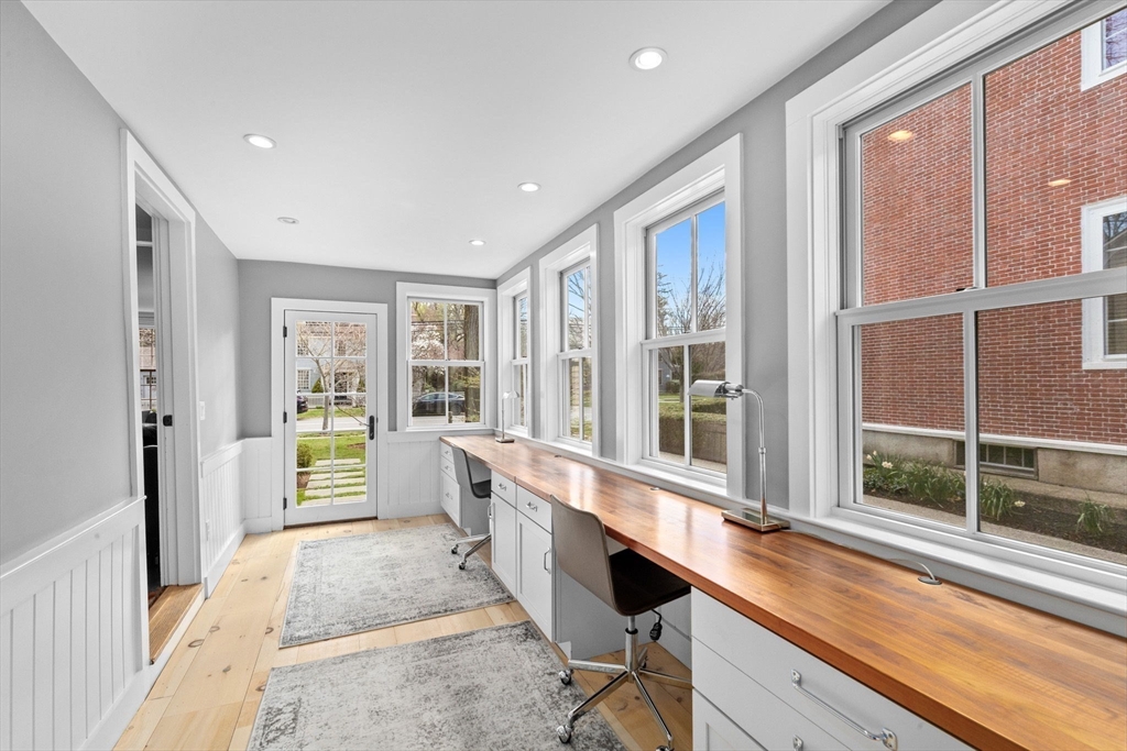 132 Main Street Hingham, MA 02043 - Photo 13 of 42 a large white kitchen with granite countertop a large window and a counter