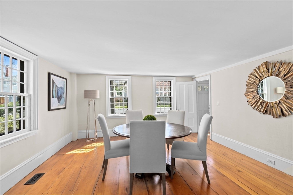 132 Main Street Hingham, MA 02043 - Photo 16 of 42 a view of a dining room with furniture and wooden floor