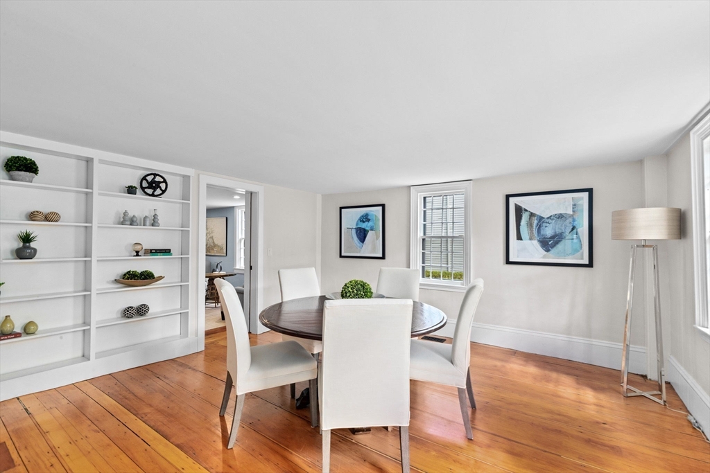 132 Main Street Hingham, MA 02043 - Photo 17 of 42 a view of a dining room with furniture and wooden floor