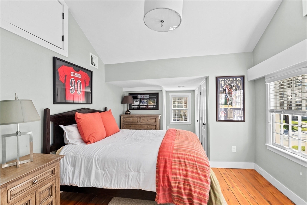 132 Main Street Hingham, MA 02043 - Photo 25 of 42 a bedroom with a large bed and a window
