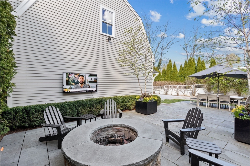 132 Main Street Hingham, MA 02043 - Photo 31 of 42 a view of a chairs and table in patio