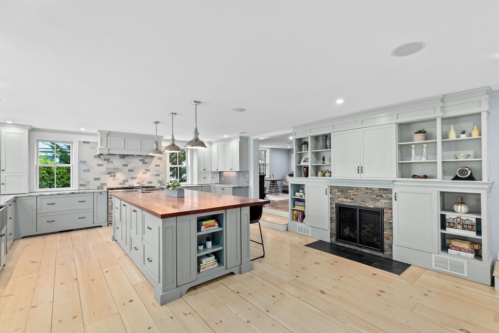132 Main Street Hingham, MA 02043 - Photo 4 of 42 a kitchen with stainless steel appliances granite countertop a stove and a sink