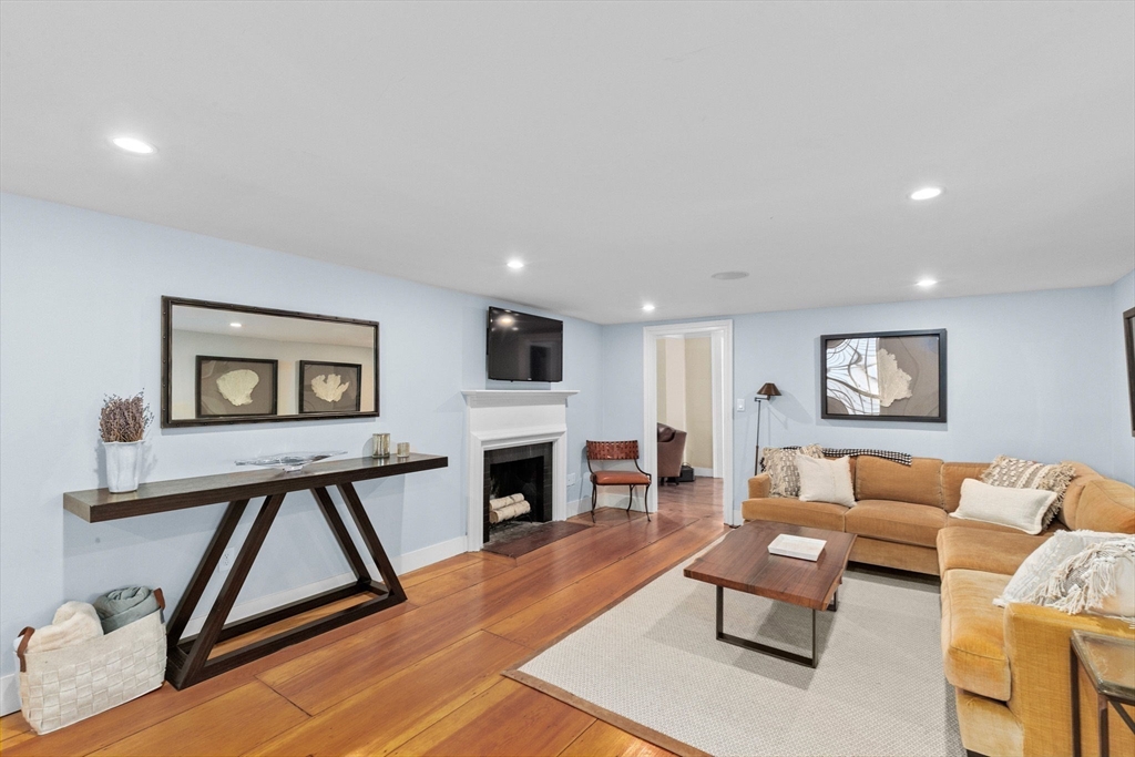 132 Main Street Hingham, MA 02043 - Photo 10 of 42 a living room with furniture and a wooden floor