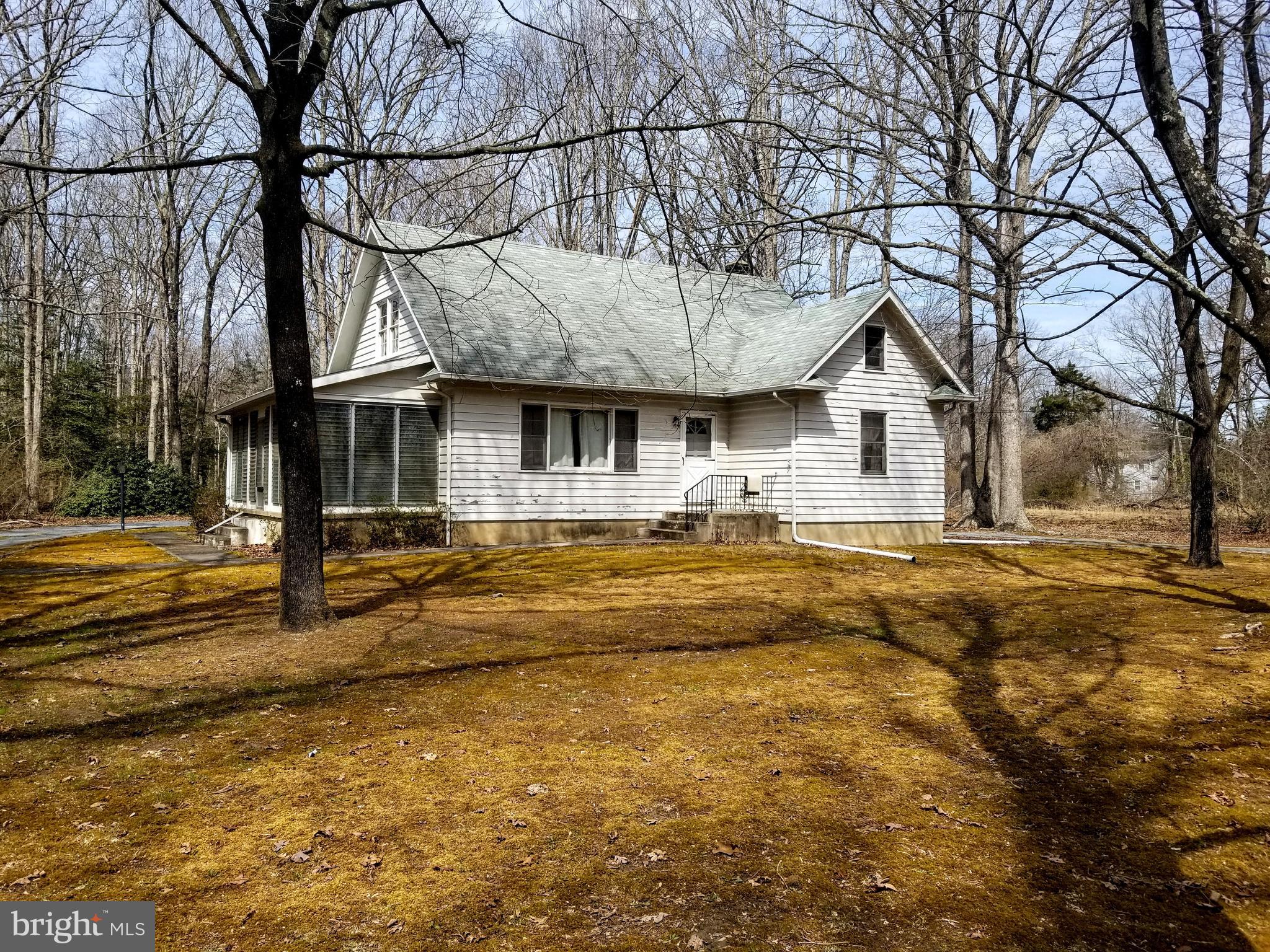 181 Buck Road Elmer, NJ 08318 - Photo 1 of 2 a front view of a house with swimming pool
