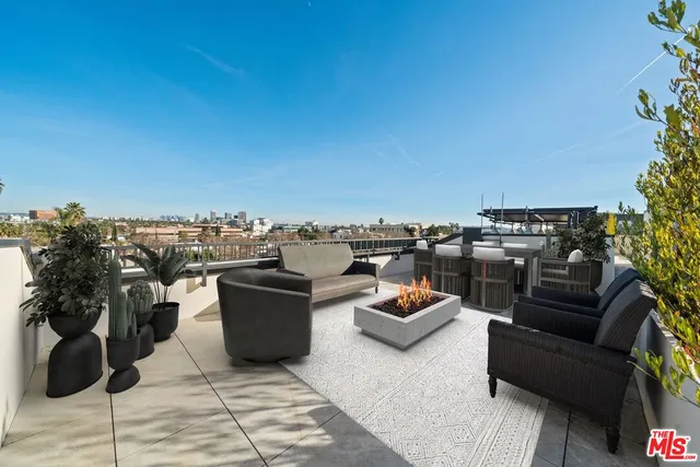a view of a terrace with furniture