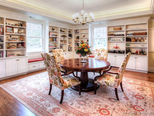 6736 Ware Neck Road Gloucester, VA 23061 - Photo 13 of 34 Oversized dining room with continuous built-ins, tray ceiling and lovely water views. Would make an excellent Library or additional family room as well.