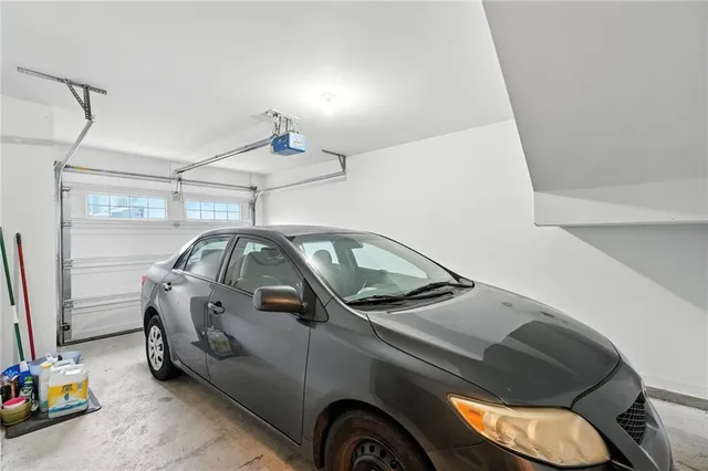 a view of a two chairs in the balcony