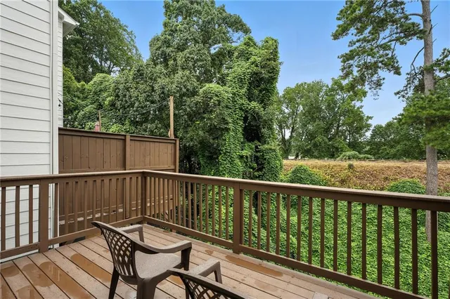 a view of a two chairs on the roof deck